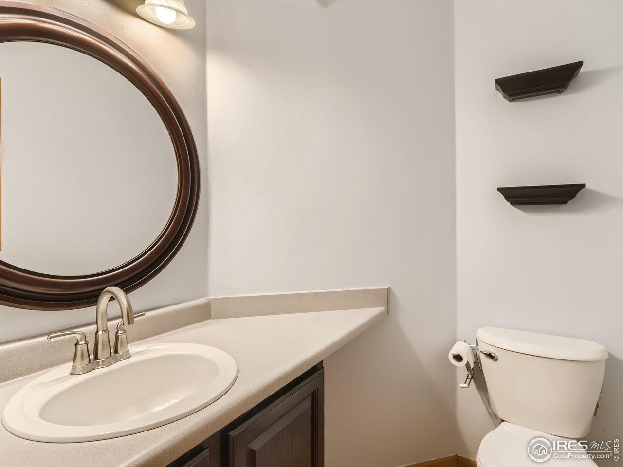 1752 Eldorado Drive Superior, CO 80027 - Photo 14 of 34 a bathroom with a sink and a mirror