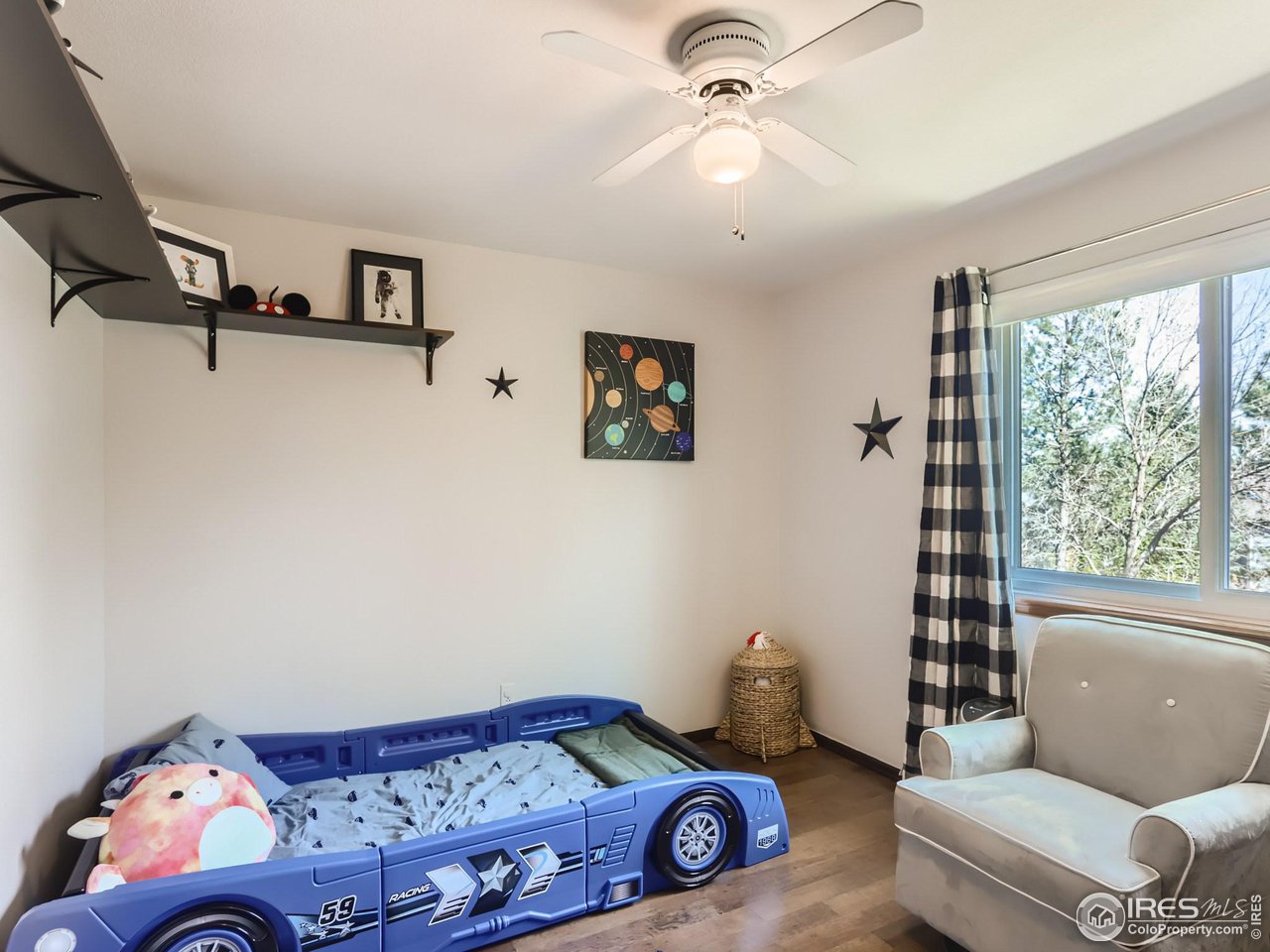 1752 Eldorado Drive Superior, CO 80027 - Photo 19 of 34 a living room with furniture and a window