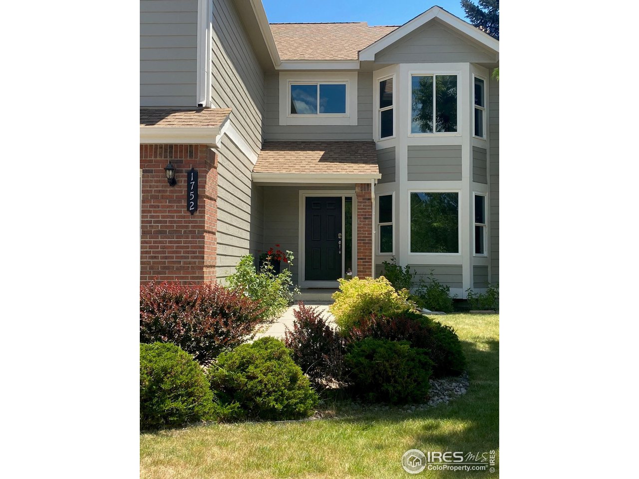 1752 Eldorado Drive Superior, CO 80027 - Photo 2 of 34 a view of a house with potted plants
