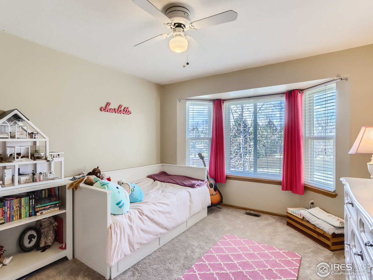 1752 Eldorado Drive Superior, CO 80027 - Photo 22 of 34 a bedroom with a bed and a window