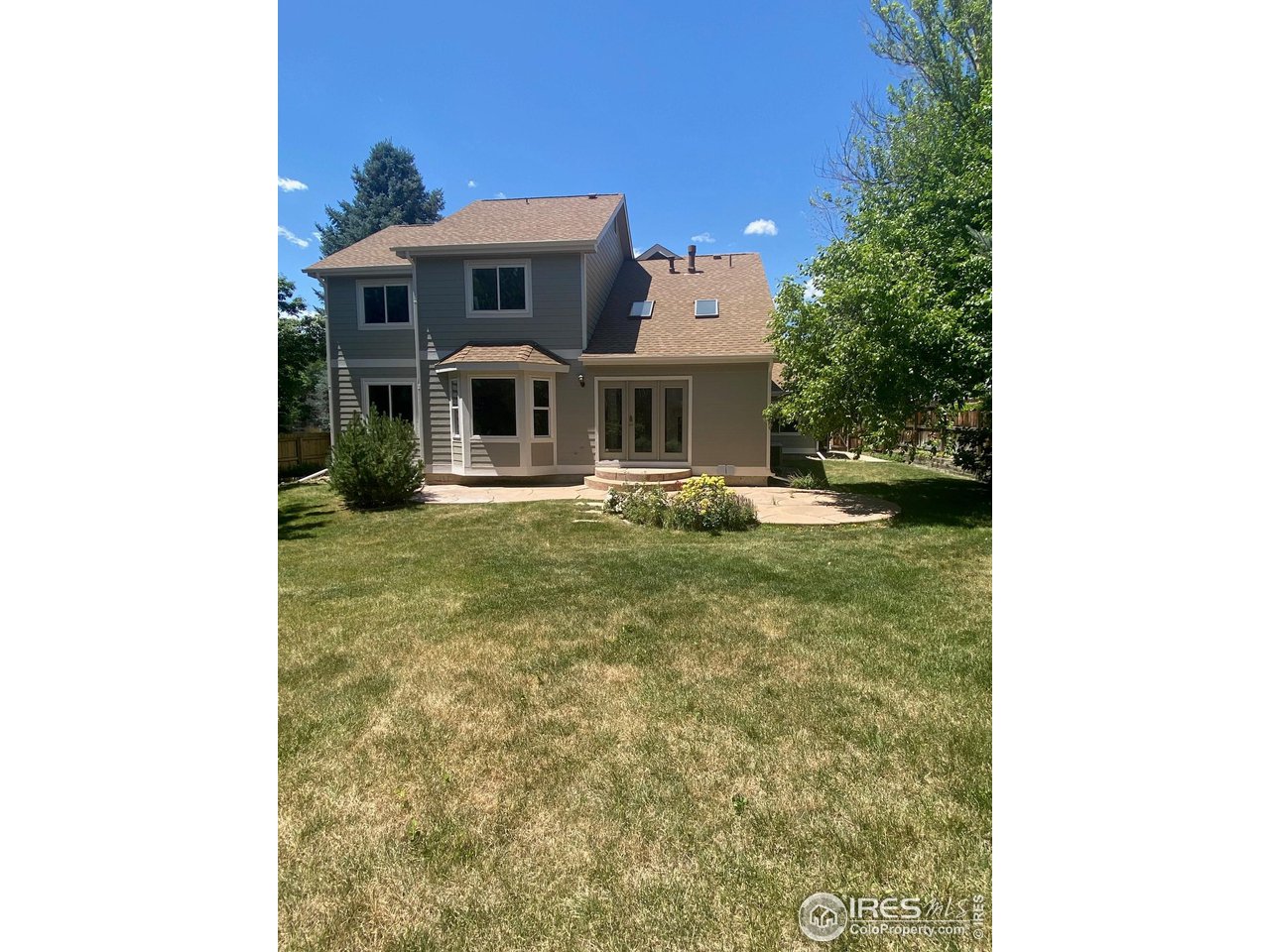 1752 Eldorado Drive Superior, CO 80027 - Photo 32 of 34 a front view of a house with garden