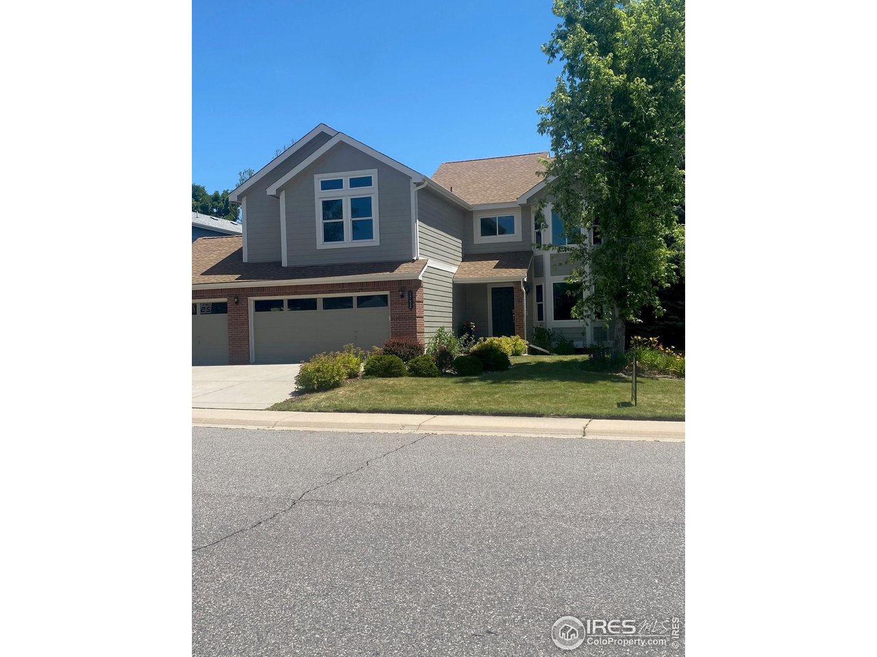 1752 Eldorado Drive Superior, CO 80027 - Photo 34 of 34 a front view of a house with a yard