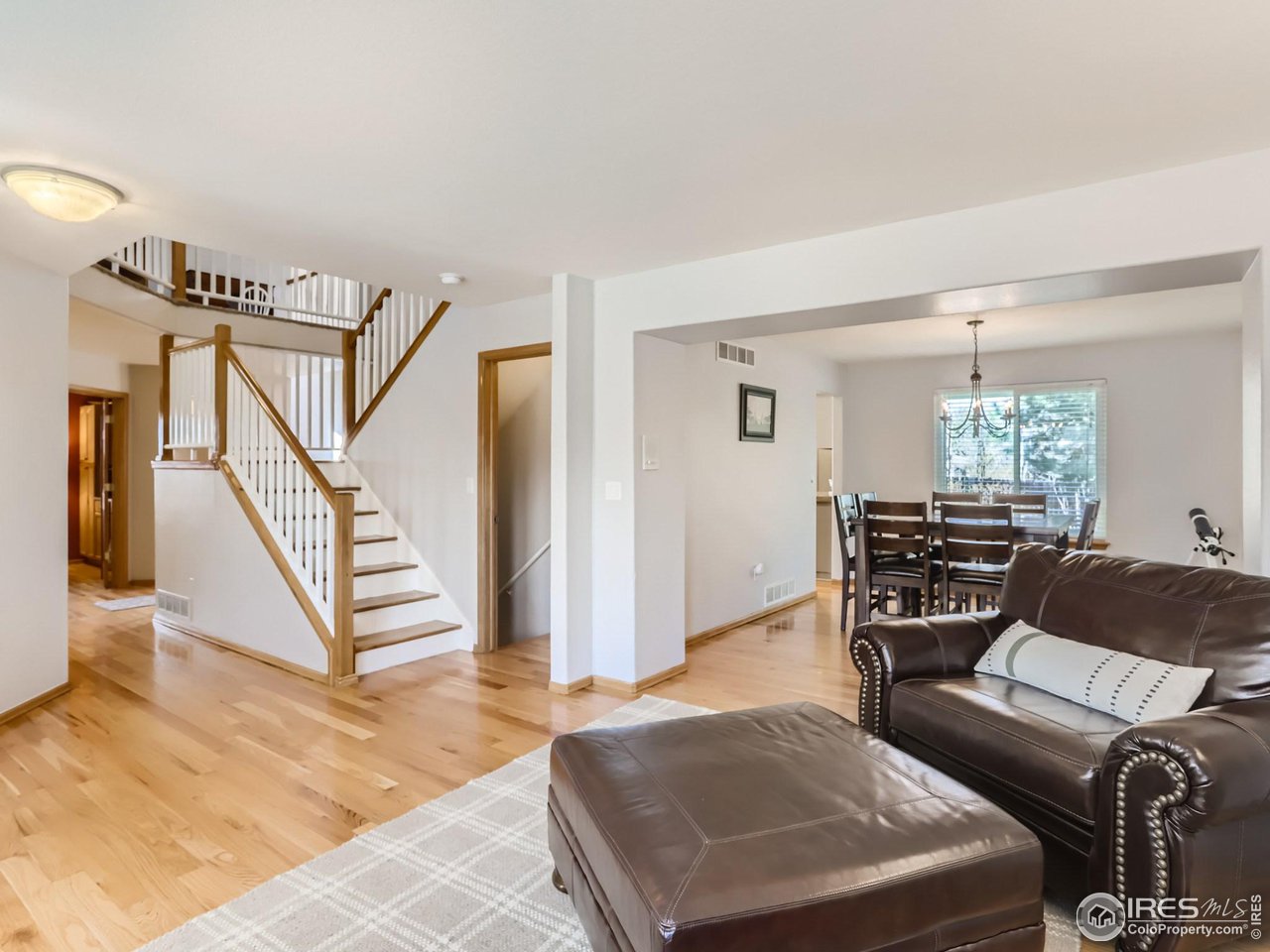 1752 Eldorado Drive Superior, CO 80027 - Photo 5 of 34 a living room with furniture and wooden floor