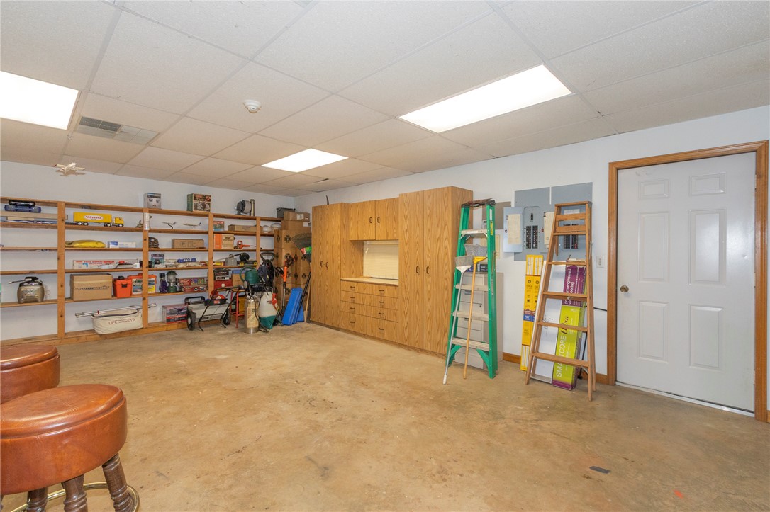 202 Plantation Point Anderson, SC 29625 - Photo 39 of 48 Functional garage offers abundant built-in storage solutions and a solid concrete floor.