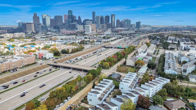 a view of a city with tall buildings