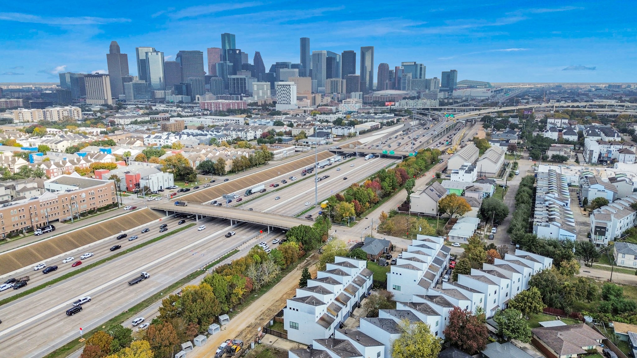2911 Chartres Street Houston, TX 77004 - Photo 2 of 37 a view of a city with tall buildings