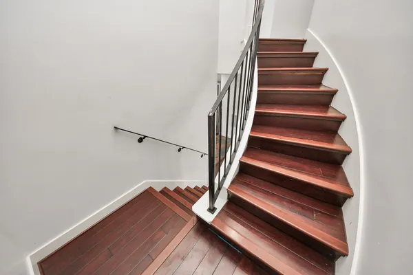 a view of balcony with wooden floor