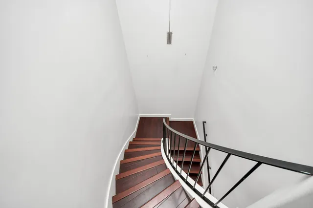 a view of entryway with wooden floor