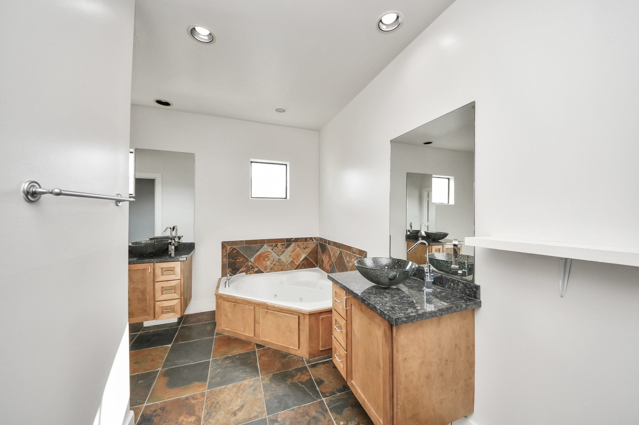2911 Chartres Street Houston, TX 77004 - Photo 28 of 37 a living room with granite countertop furniture and a fireplace