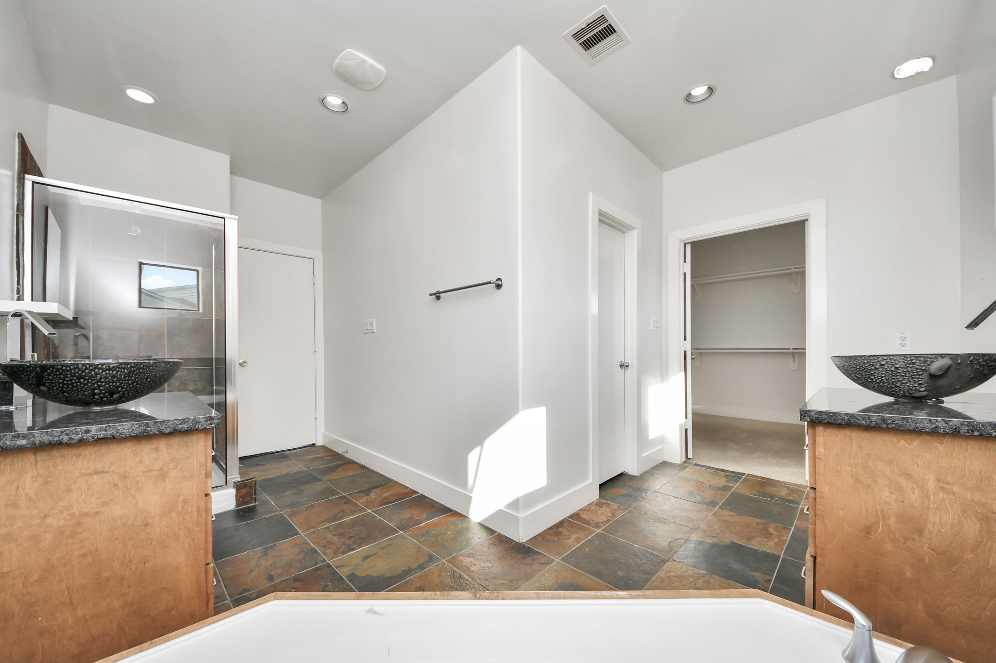 2911 Chartres Street Houston, TX 77004 - Photo 34 of 37 a bathroom with a sink and a mirror