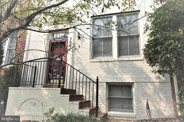 front view of a house with a street