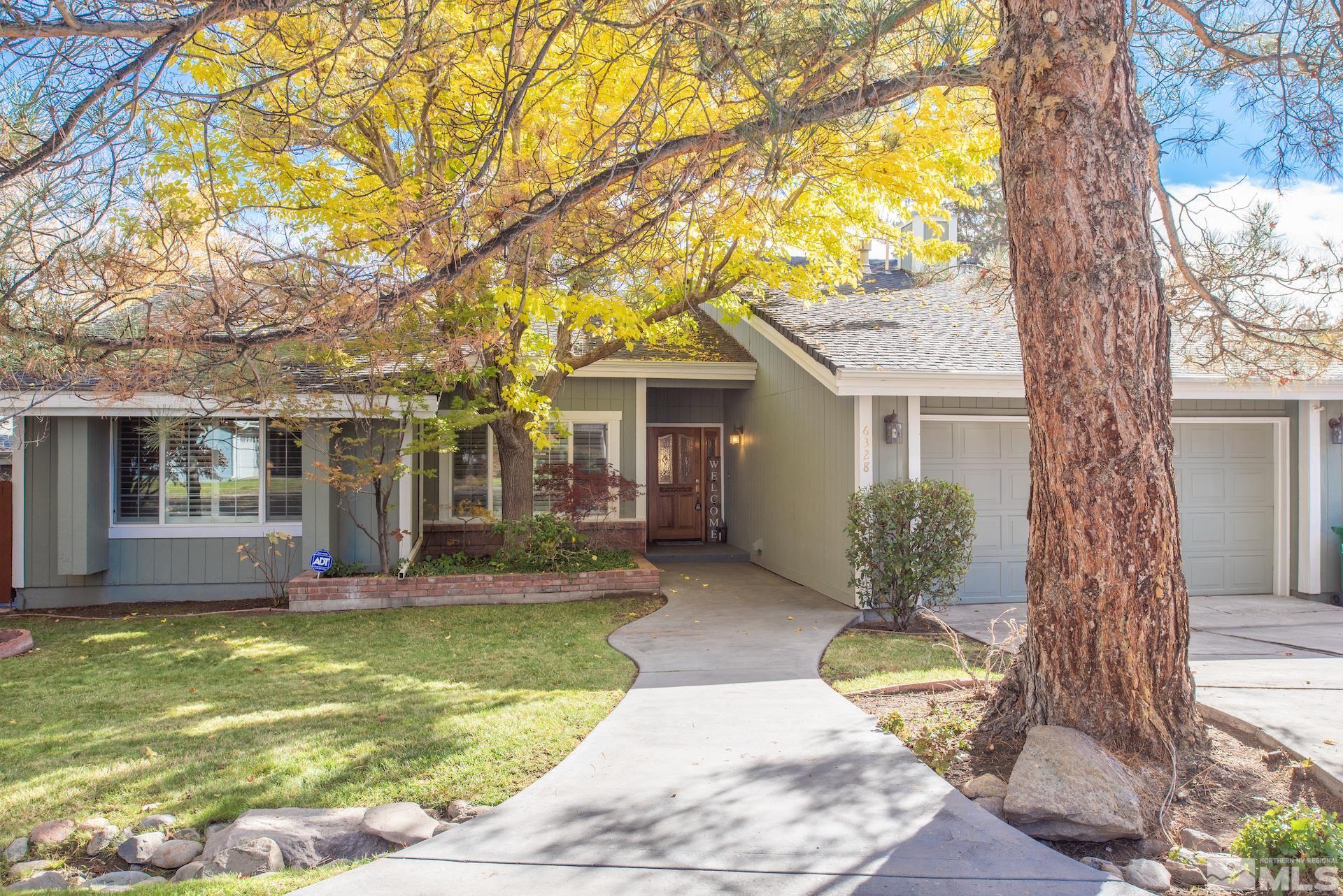 6328 Windy Meadow Drive Reno, NV 89519 - Photo 1 of 35 front view of a house with a yard