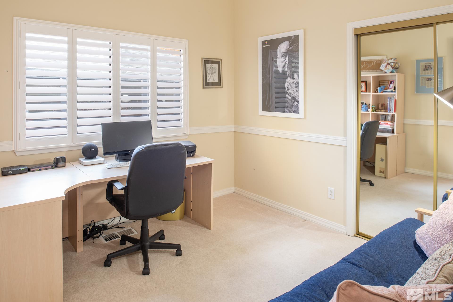 6328 Windy Meadow Drive Reno, NV 89519 - Photo 17 of 35 a view of a workspace with furniture and a window