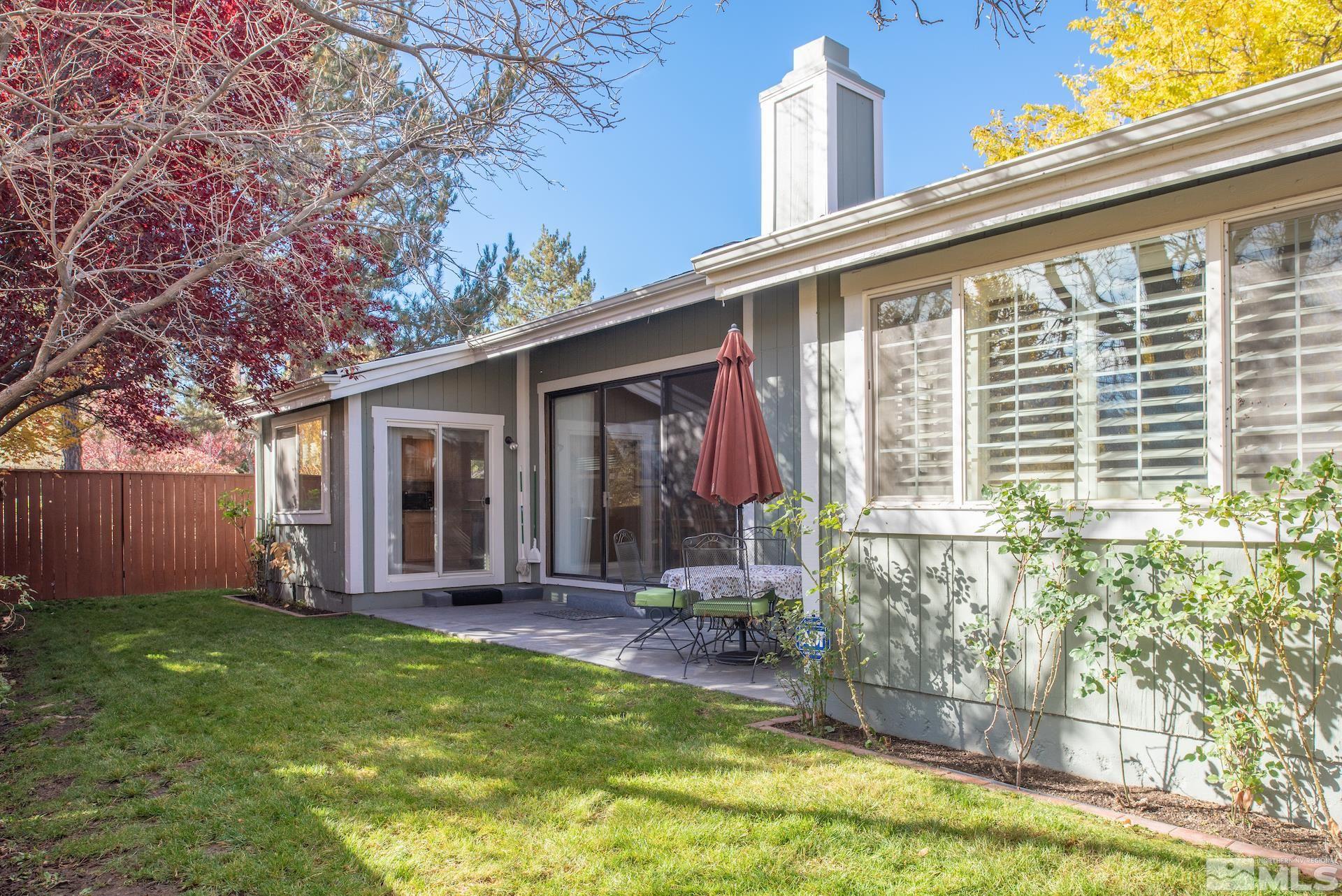 6328 Windy Meadow Drive Reno, NV 89519 - Photo 21 of 35 a view of a house with backyard and porch