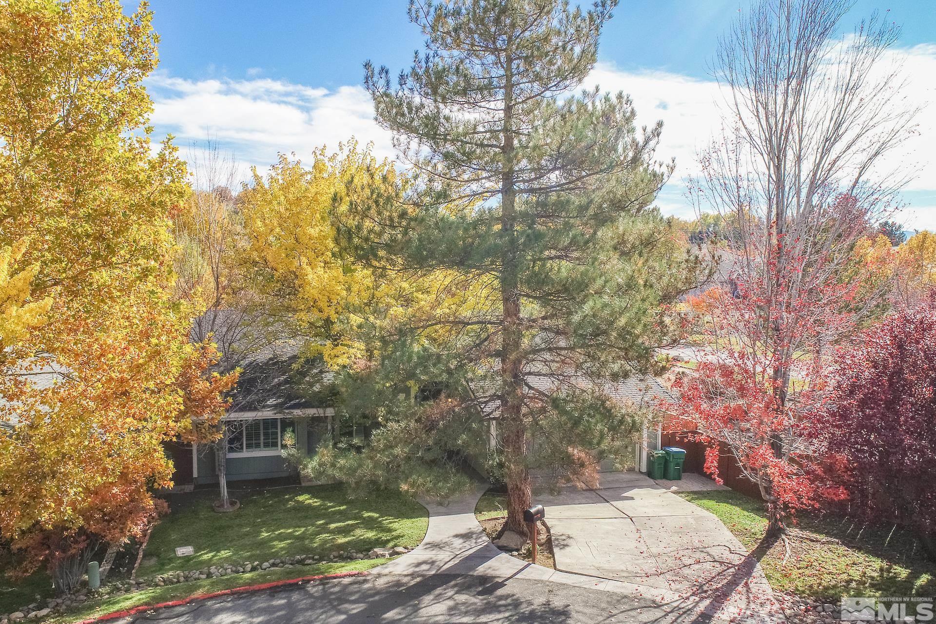 6328 Windy Meadow Drive Reno, NV 89519 - Photo 29 of 35 a view of a house with a yard