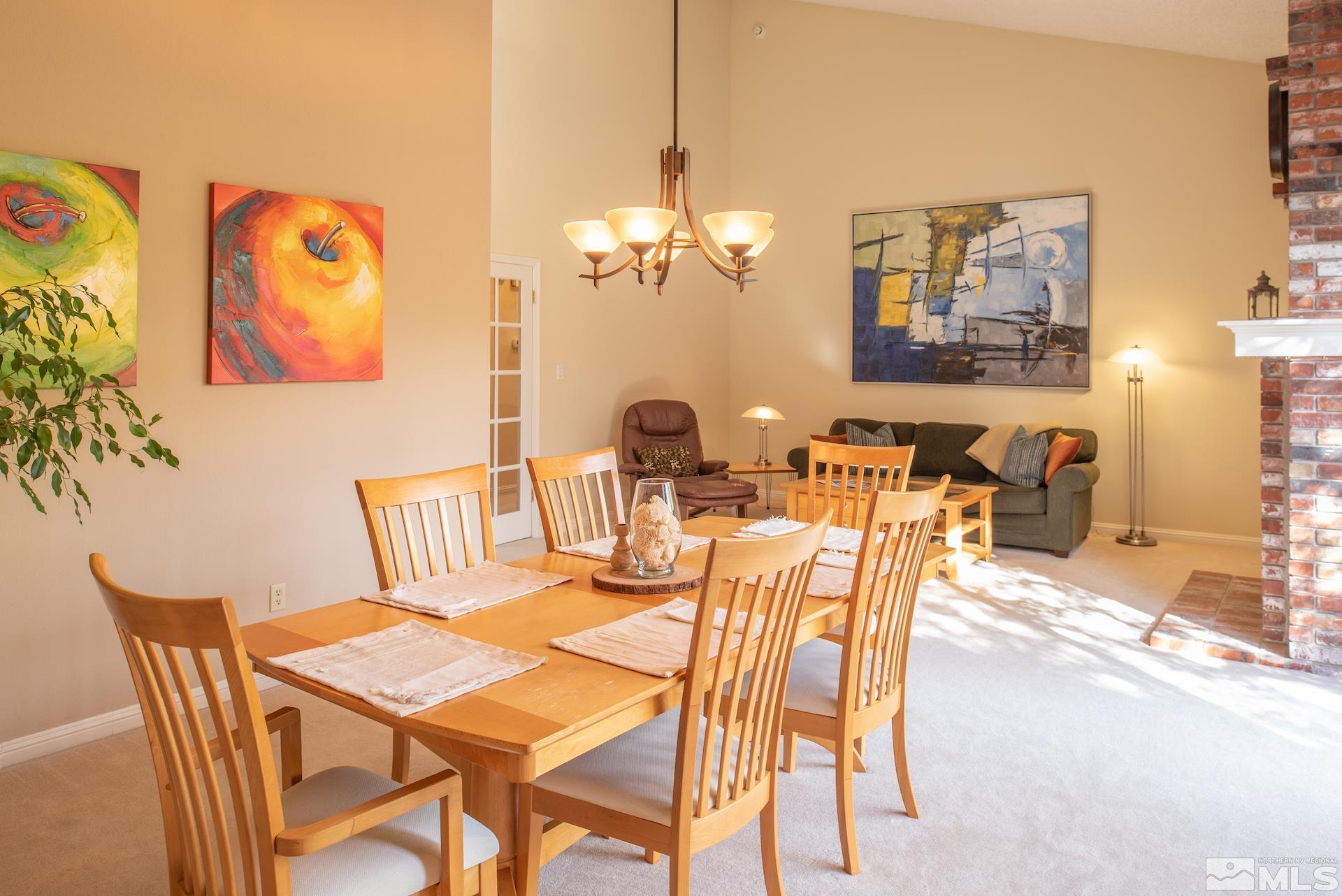 6328 Windy Meadow Drive Reno, NV 89519 - Photo 5 of 35 a view of a dining room with furniture