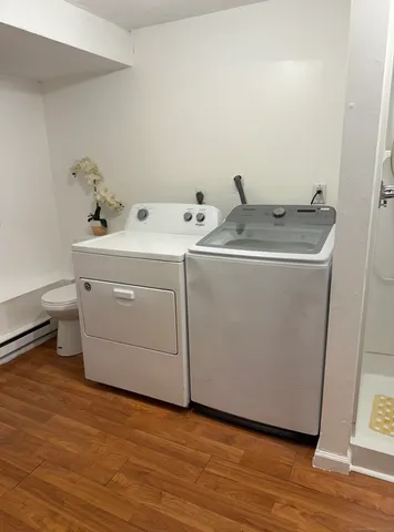 a utility room with dryer and washer