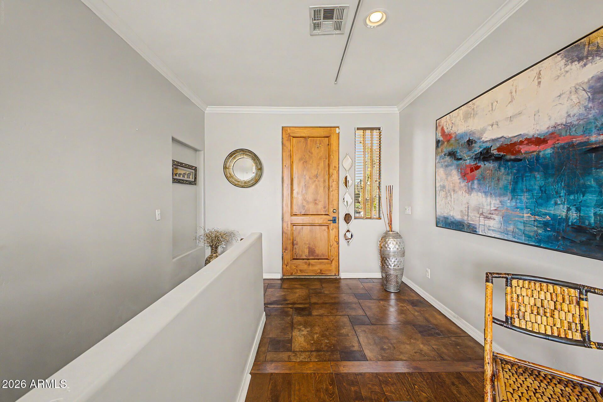10009 North 1st Drive Phoenix, AZ 85021 - Photo 4 of 15 a hallway with sliding door and wooden floor