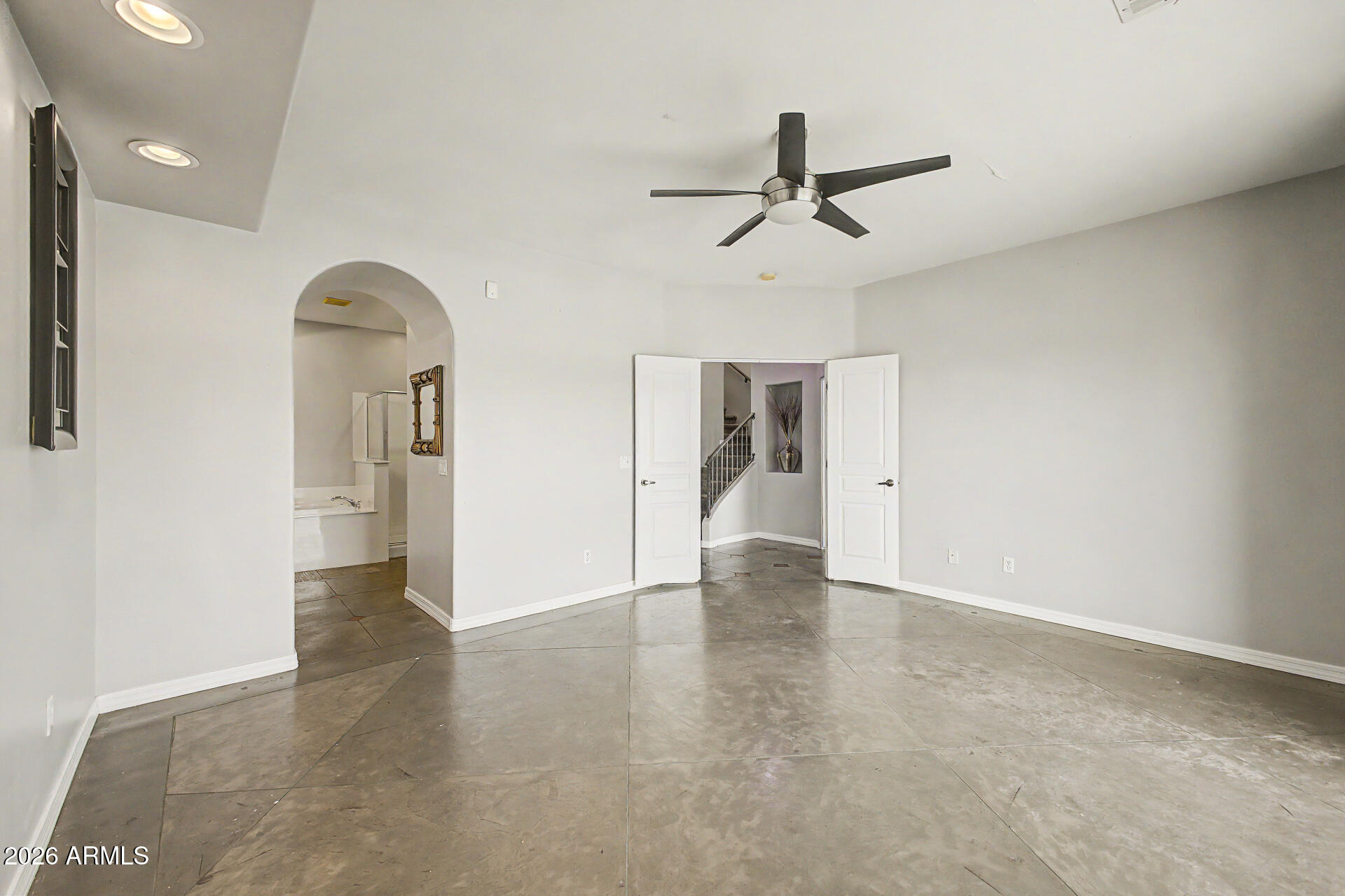 10009 North 1st Drive Phoenix, AZ 85021 - Photo 10 of 15 a view of empty room with wooden floor and window