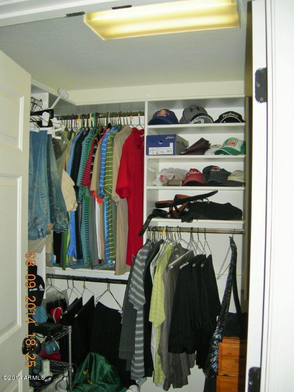 3935 East Rough Rider Road, Unit 1003 Phoenix, AZ 85050 - Photo 29 of 53 Closet Design