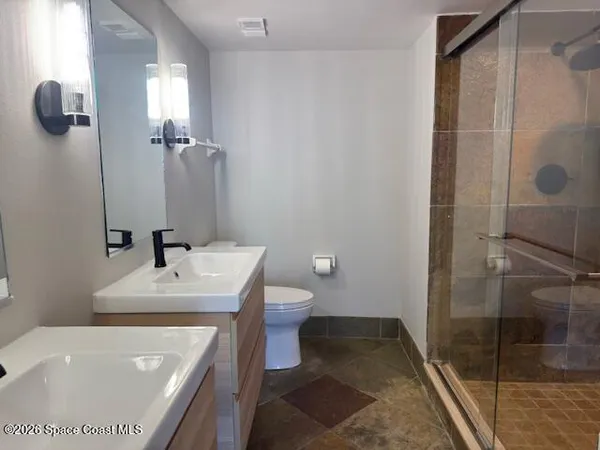 a view of a room that has a window in it