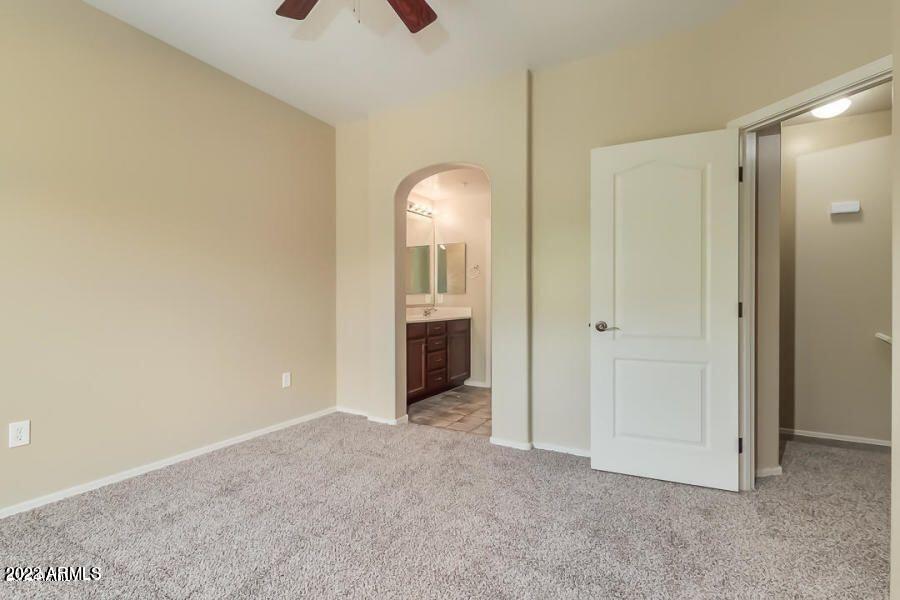 4750 East Thunderheart Trail, Unit 102 Gilbert, AZ 85297 - Photo 16 of 25 a view of empty room with a fireplace