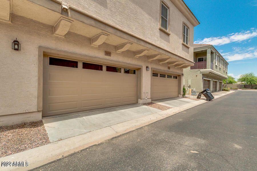 4750 East Thunderheart Trail, Unit 102 Gilbert, AZ 85297 - Photo 23 of 25 a view of a car garage