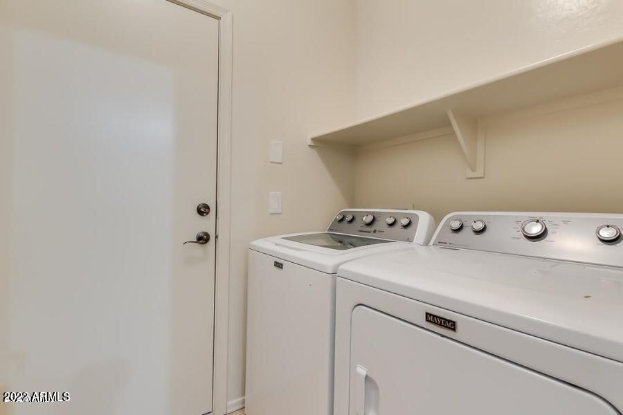 4750 East Thunderheart Trail, Unit 102 Gilbert, AZ 85297 - Photo 25 of 25 a utility room with dryer and washer