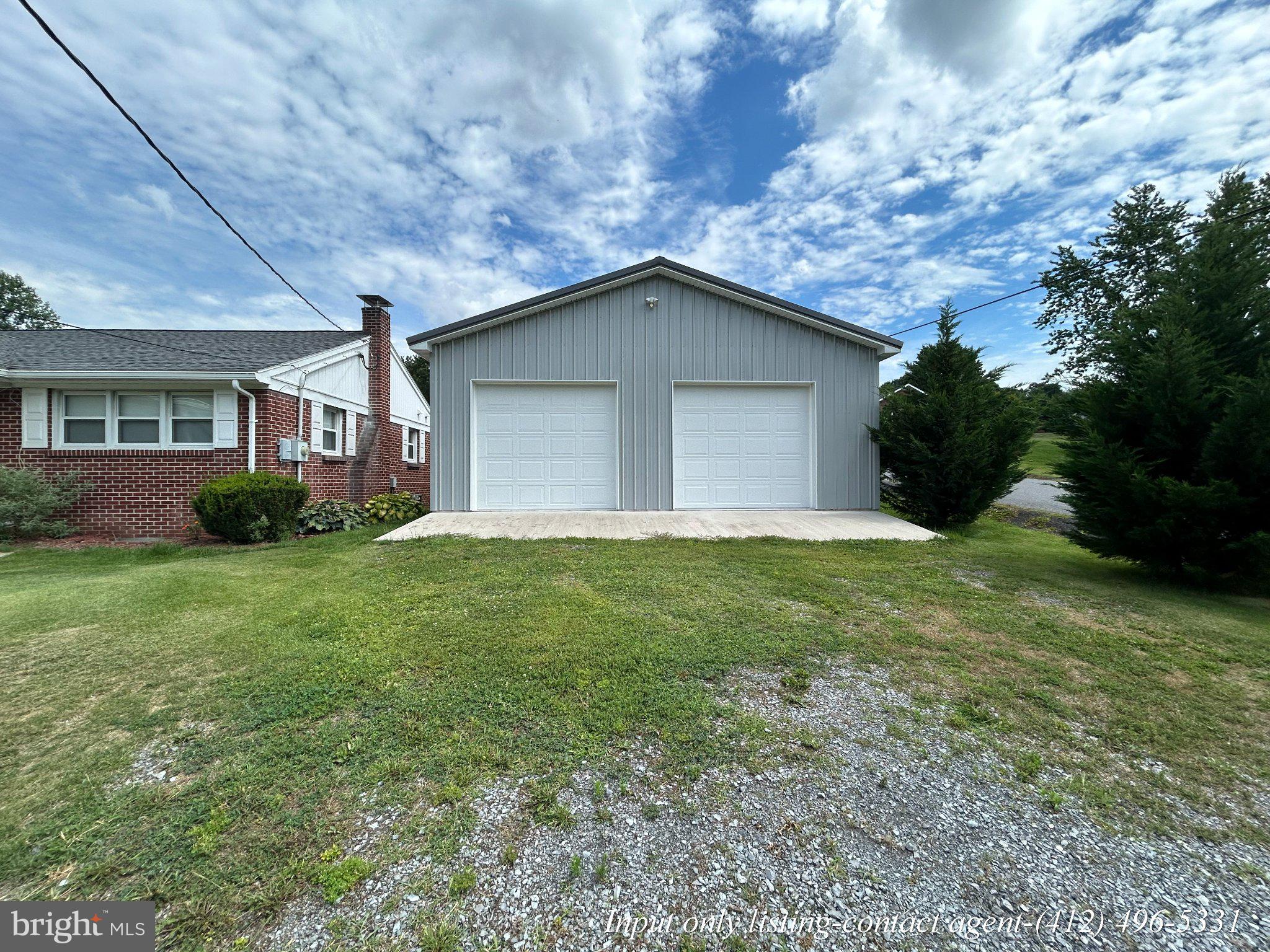 500 Raystown Road Everett, PA 15537 - Photo 3 of 41 Spacious garage with scenic backdrop.