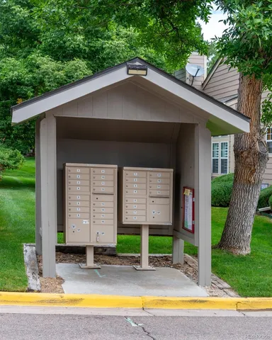 a house with swimming pool in front of it