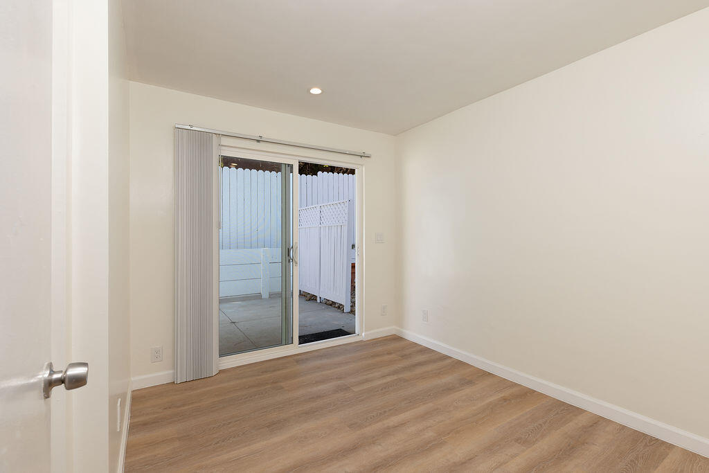 24 Pine Drive Santa Barbara, CA 93105 - Photo 20 of 45 a view of a hallway with wooden floor