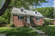 2313 Eccleston Street Silver Spring, MD 20902 - Photo 1 of 13 a view of house with a yard