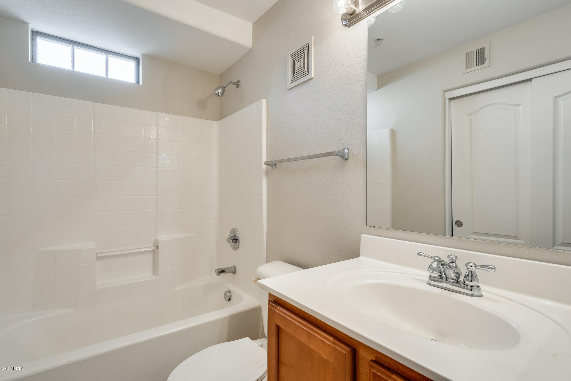 2401 East Rio Salado Parkway, Unit 1124 Tempe, AZ 85288 - Photo 28 of 32 a bathroom with a sink toilet tub and shower