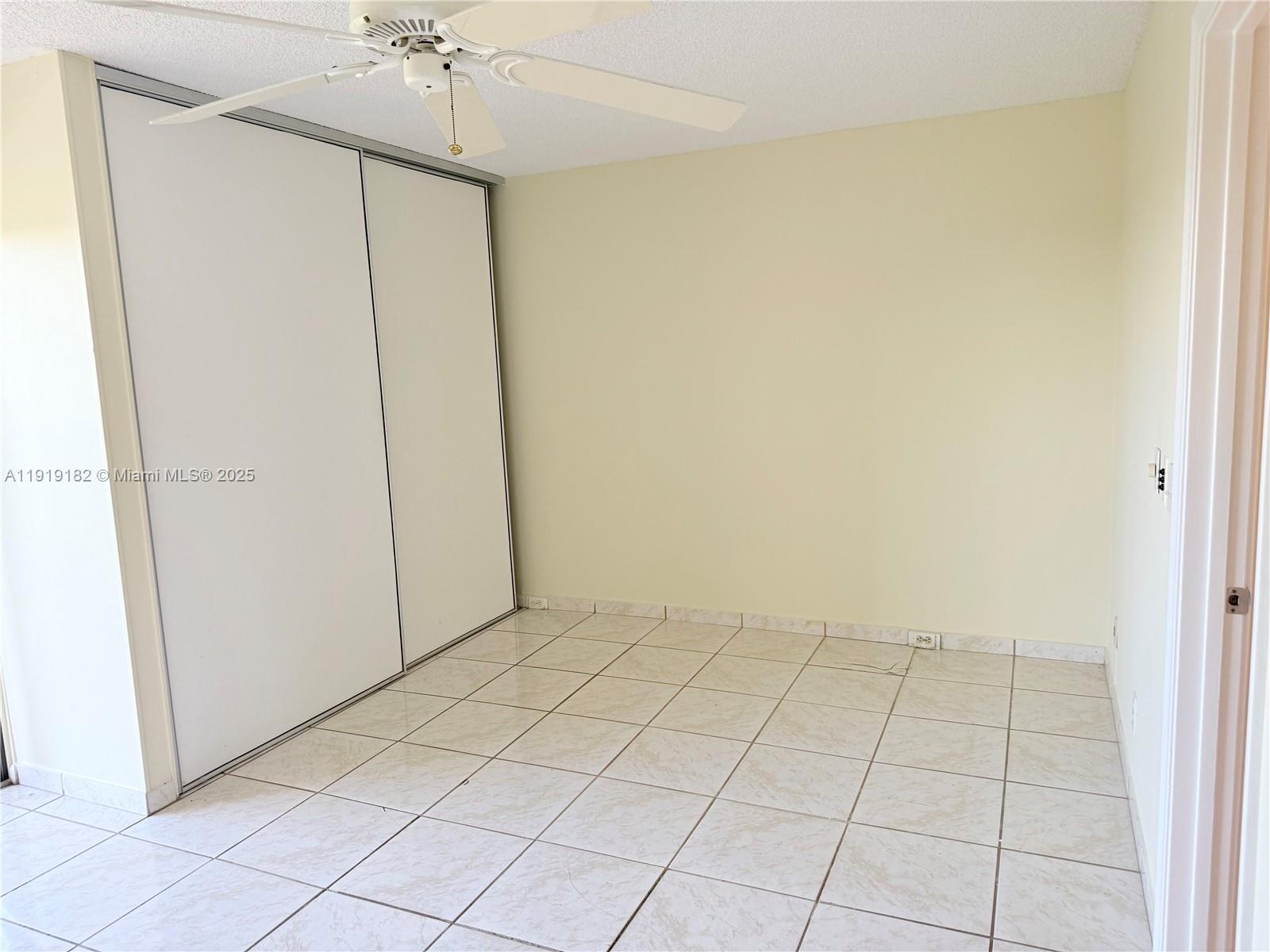850 Southwest 133rd Terrace, Unit 416B Pembroke Pines, FL 33027 - Photo 9 of 13 a view of an empty room
