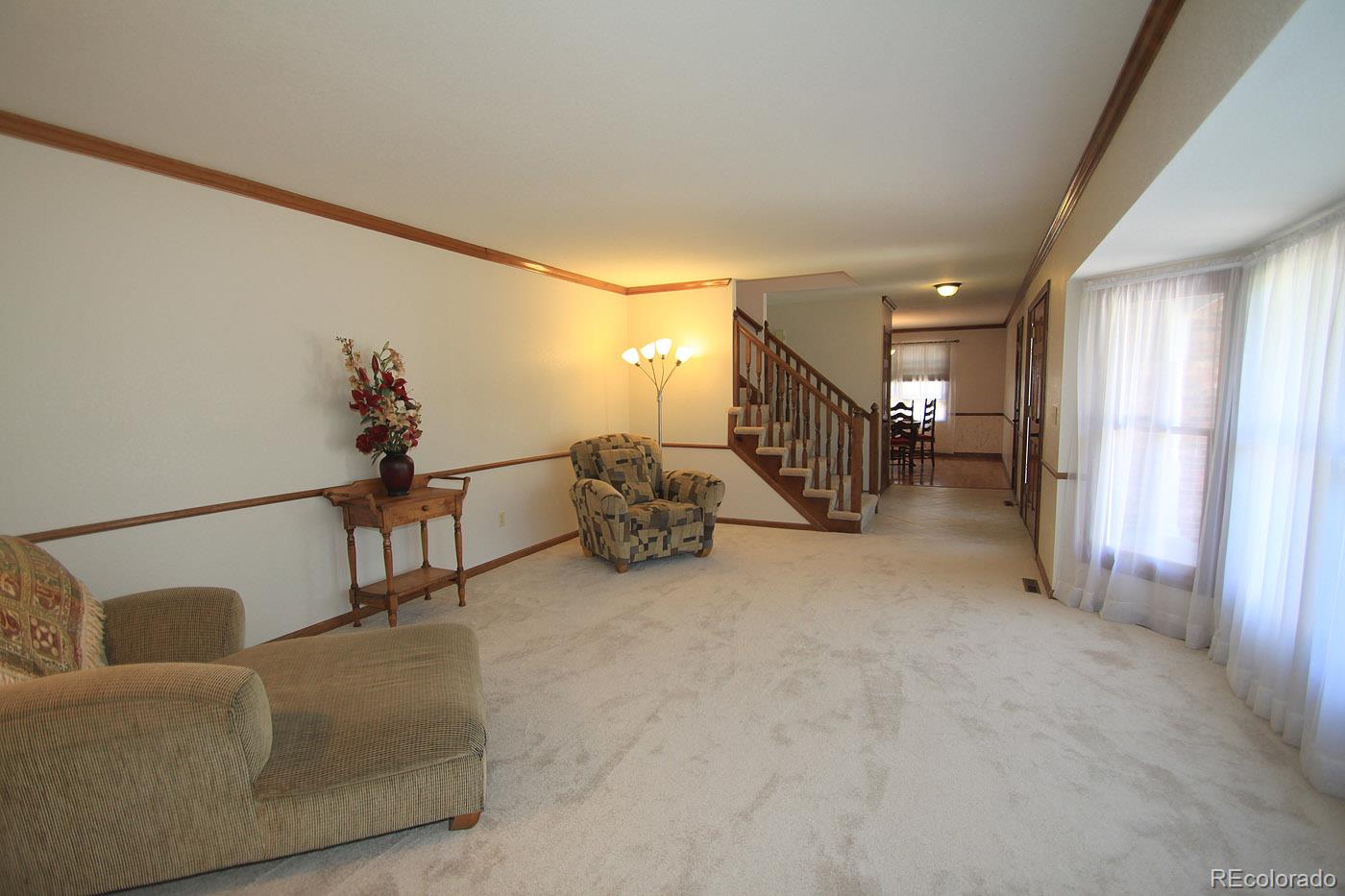 8198 Sweet Water Road Lone Tree, CO 80124 - Photo 3 of 23 a view of livingroom with furniture