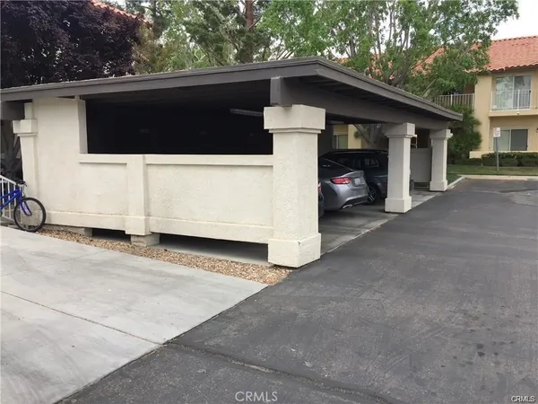 a view of a house with a street