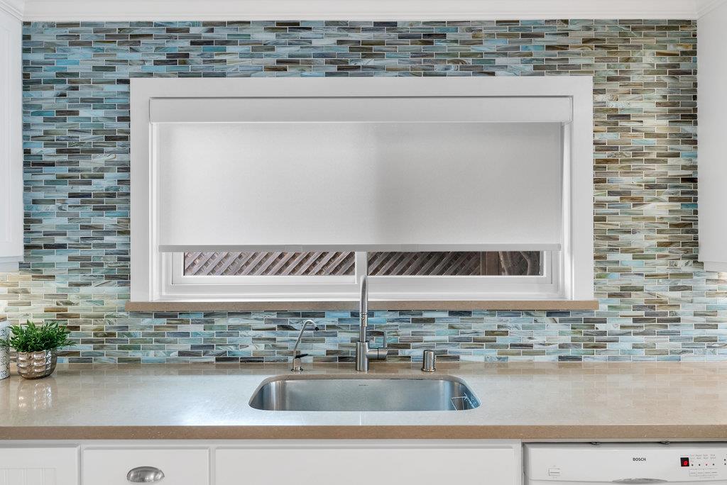 114 Bennett Road Aptos, CA 95003 - Photo 15 of 37 a kitchen with a sink and a wooden floor