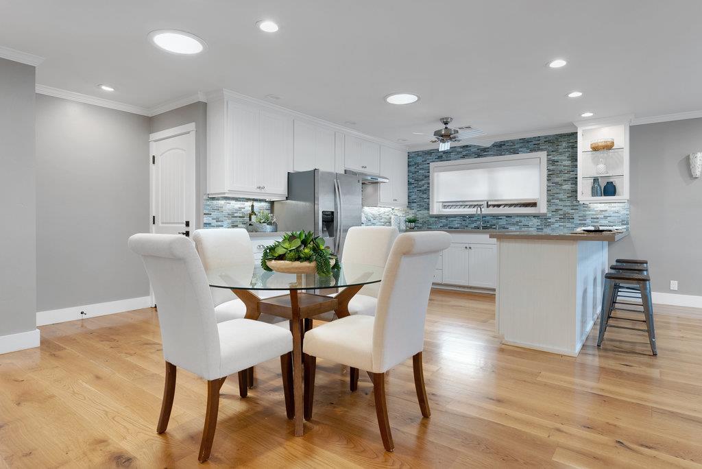 114 Bennett Road Aptos, CA 95003 - Photo 16 of 37 a view of a dining room with furniture and wooden floor