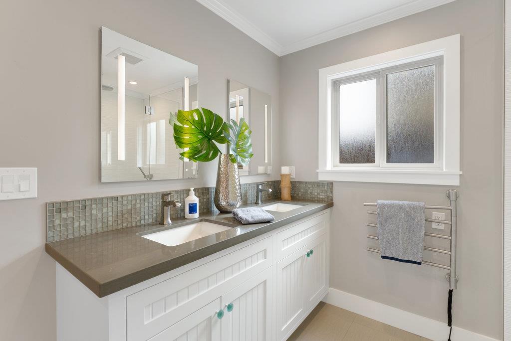 114 Bennett Road Aptos, CA 95003 - Photo 21 of 37 a bathroom with a sink and a mirror