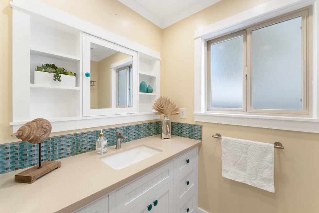114 Bennett Road Aptos, CA 95003 - Photo 29 of 37 a bathroom with a sink and a mirror