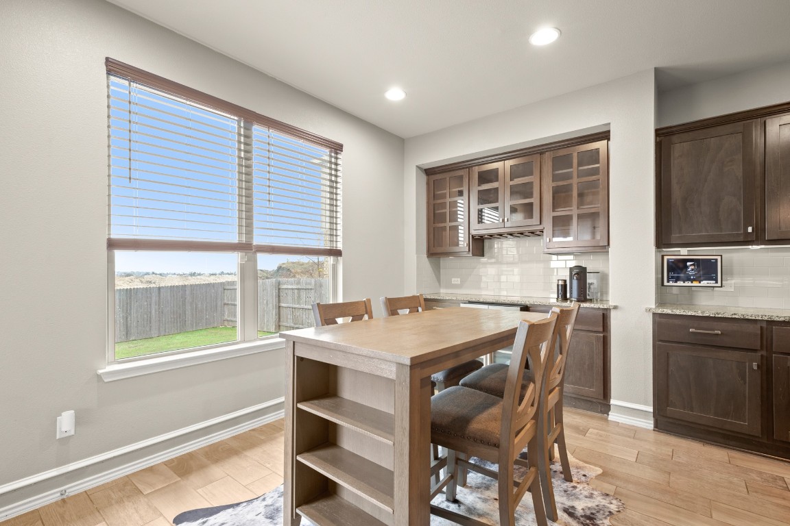 1006 Chad Loop Round Rock, TX 78665 - Photo 12 of 26 a view of a dining room with furniture and window