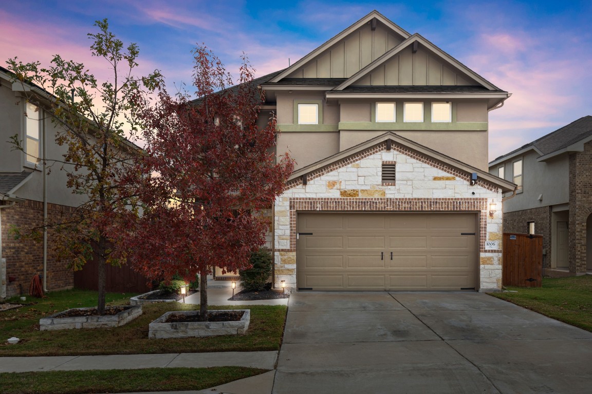 1006 Chad Loop Round Rock, TX 78665 - Photo 26 of 26 a front view of a house with a yard