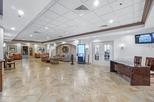 a view of a chairs and table in a patio