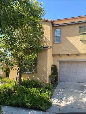 a view of a garden with pathway