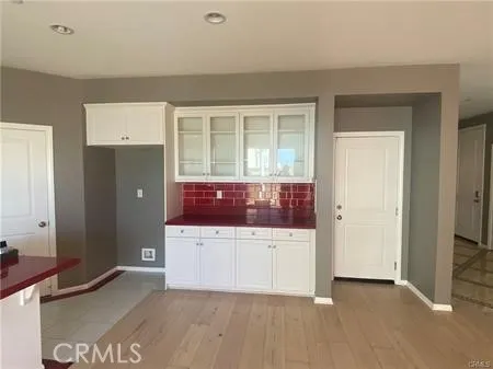 an entryway with a kitchen