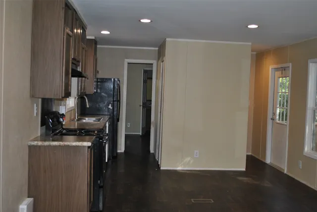 a view of a hallway with workspace