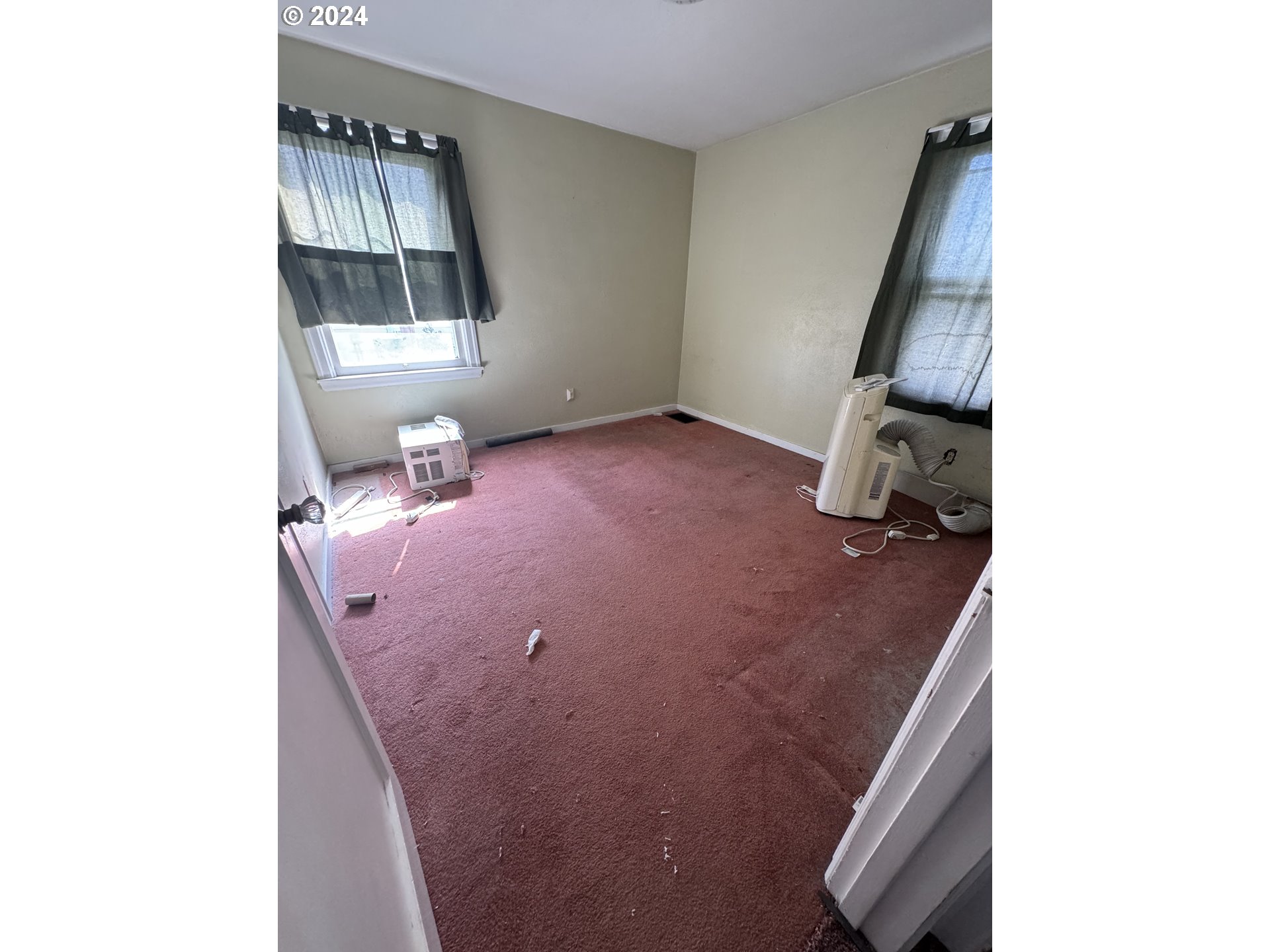 770 Diagonal Boulevard Hermiston, OR 97838 - Photo 6 of 10 a view of a livingroom with furniture and staircase