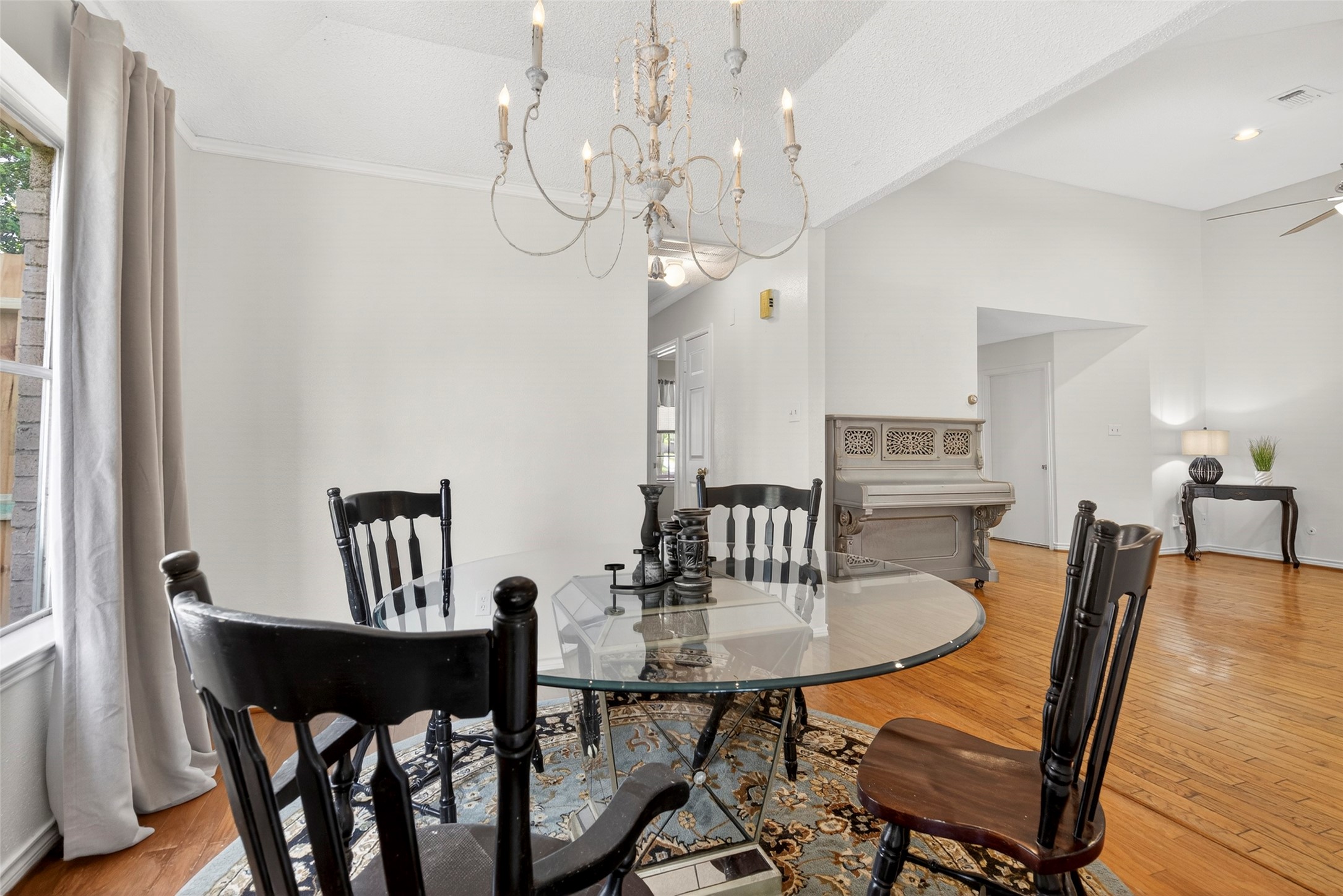 9206 Kirkleigh Lane Spring, TX 77379 - Photo 11 of 47 The hallway on the left takes you to the additional 2 bedrooms and bathroom.