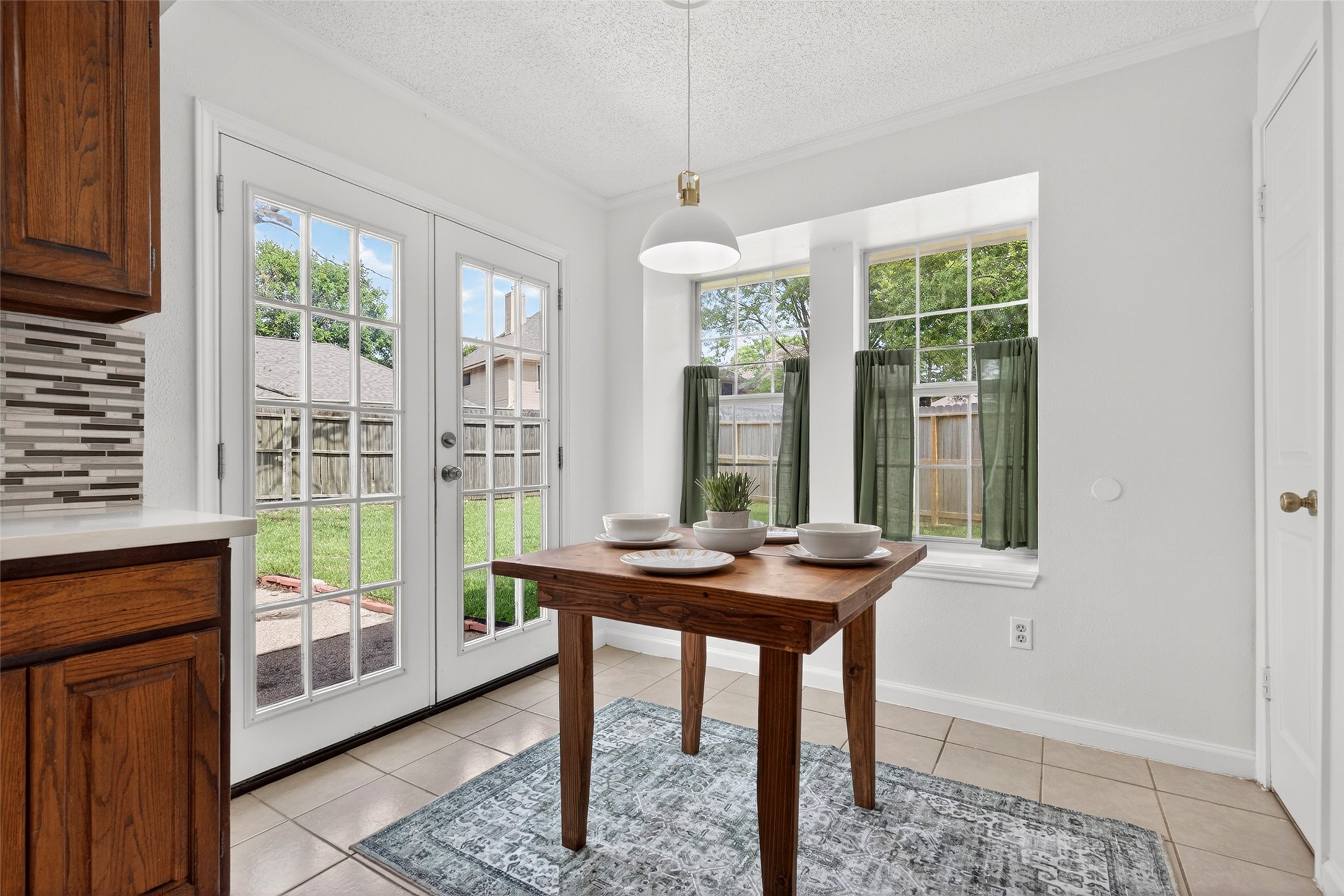 9206 Kirkleigh Lane Spring, TX 77379 - Photo 20 of 47 Beautiful French doors and bay windows let natural light in.