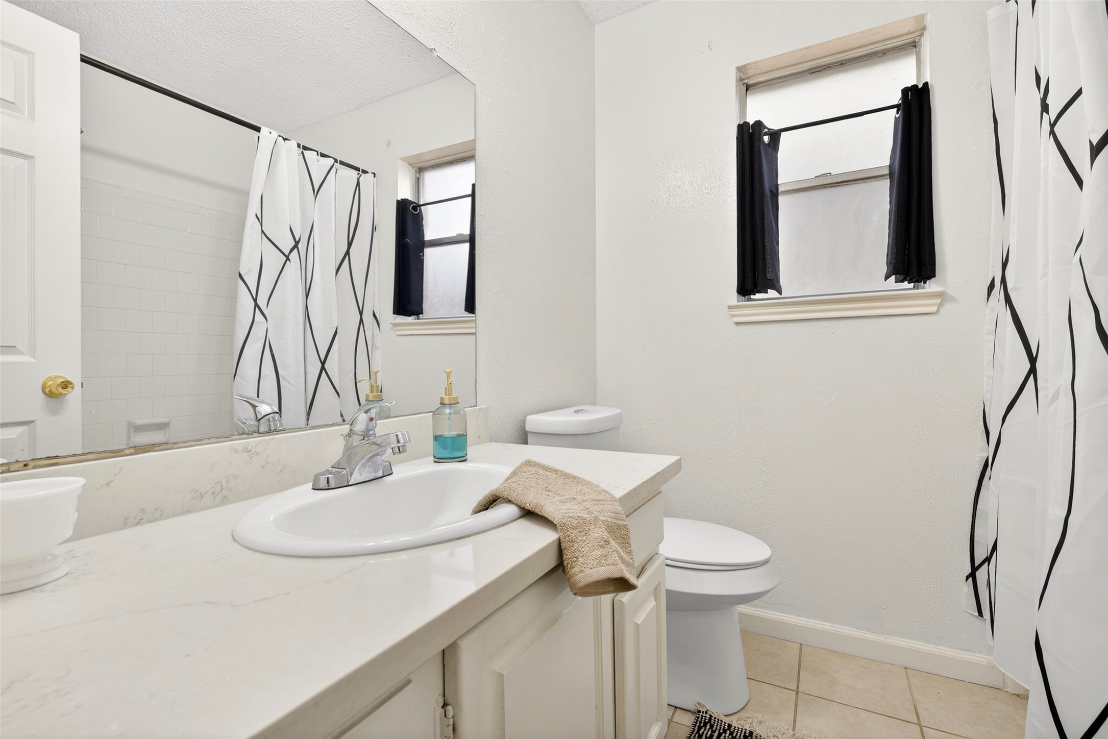 9206 Kirkleigh Lane Spring, TX 77379 - Photo 26 of 47 Secondary full bathroom with new commode.